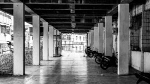 A black and white photo of parking garage